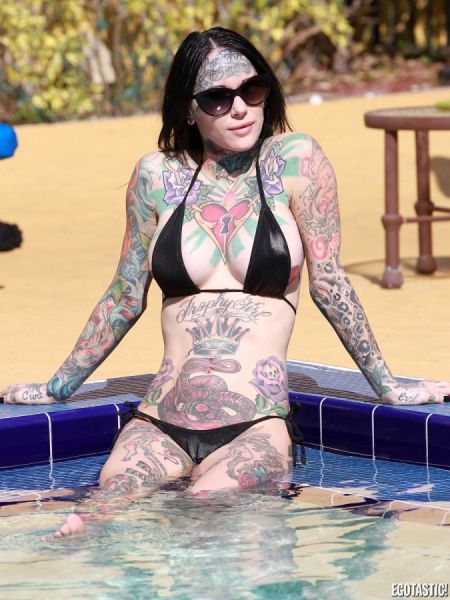 tattooed_michelle_mcgee_in_black_bikini_640_06