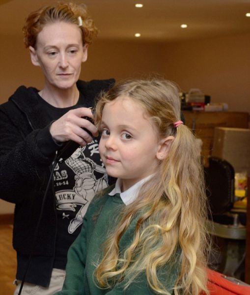 5yearold_gets_long_locks_chopped_640_01