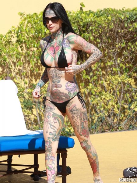 tattooed_michelle_mcgee_in_black_bikini_640_04