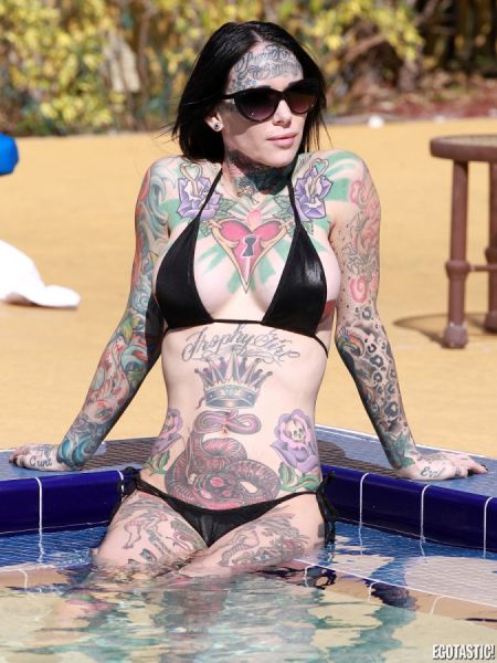 tattooed_michelle_mcgee_in_black_bikini_640_07